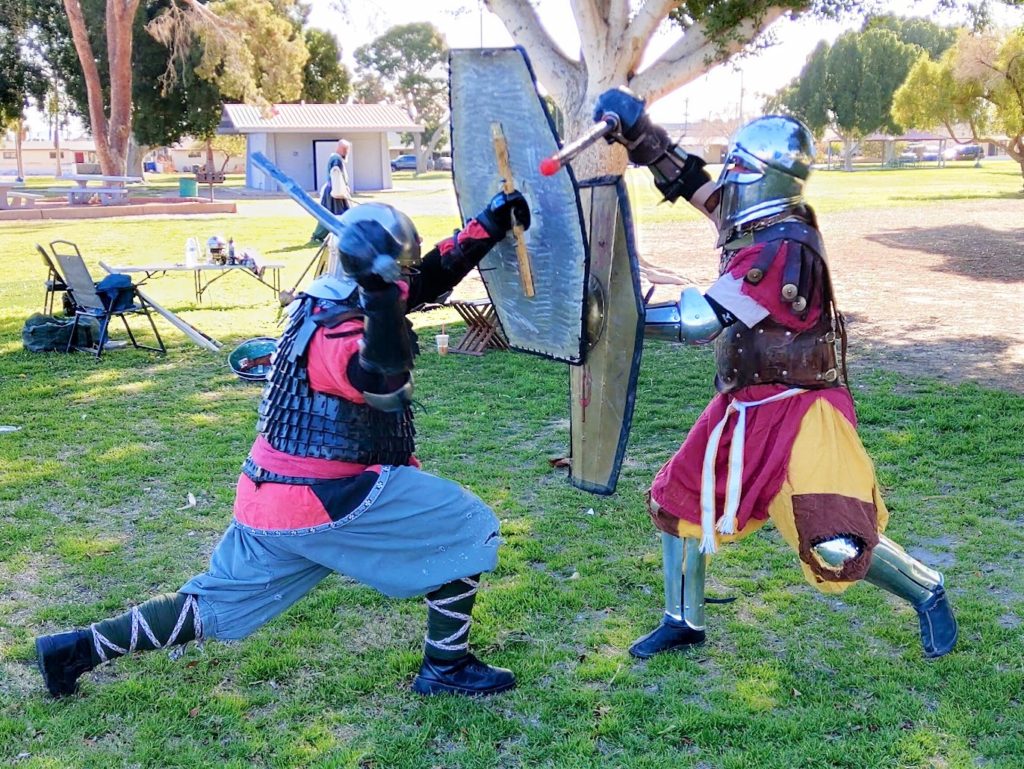 Two Armored Heavy Combat Fighters at Practice