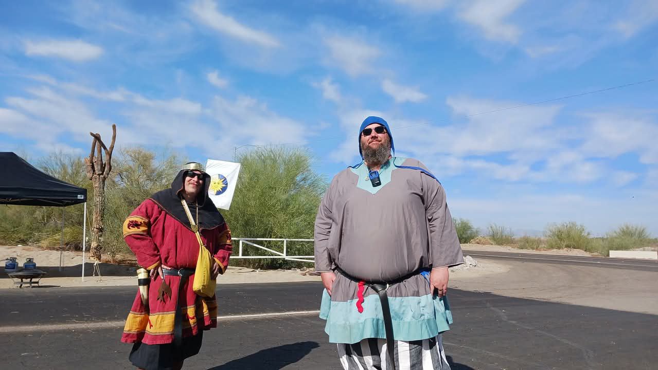 Populace member Flip volunteering for War and waving a friendly greeting.